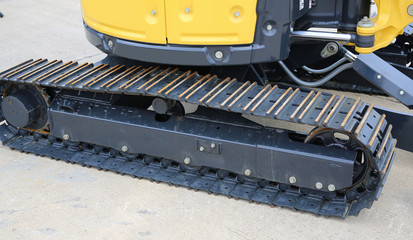 wheel of yellow track-type loader excavator