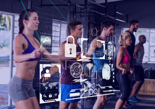 People doing workout with jump ropes in gym - Powered by Adobe