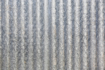 Corrugated steel sheet useful as a background
