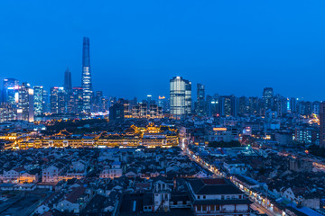 illuminated cityscape at night in financial district of China.