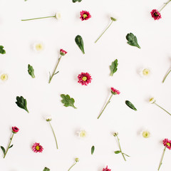 Flower pattern with red and white wildflowers, green leaves, branches on white background. Flat lay, top view. Floral background.