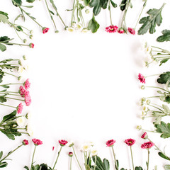 Wreath frame of red and white wildflowers, green leaves, branches on white background. Flat lay, top view. Valentine's background
