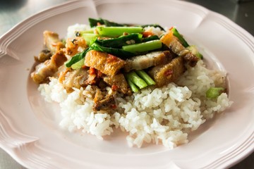 Chinese kale and deep fried pork with rice