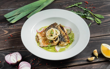 carp fillet with cream of celery and lemon sauce