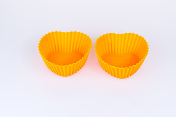 A color silicone cake form on a white background