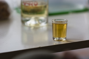 Full glass of alcohol.