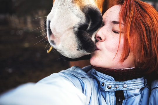 Girl's selfie with a horse - Powered by Adobe