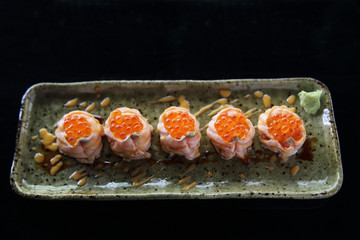 Salmon sushi ball with salmon caviar