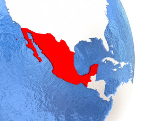 Mexico on shiny globe with water