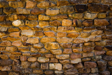 background and texture of granite stone wall surface.