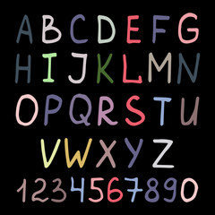 Colorful handwritten alphabet on black