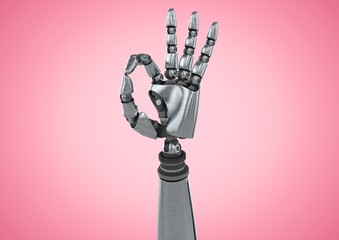 Robot hand showing ok sign against pink background