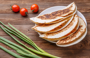 Tortilla with chicken and onions