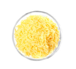 Glass bowl with grated cheese on white background