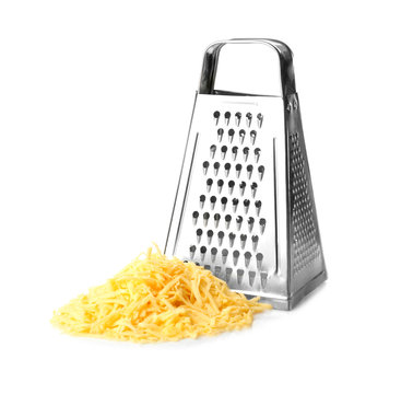 Metal grater and pile of grated cheese on white background