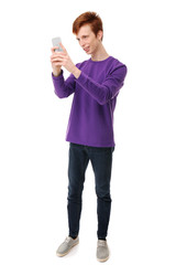 Teenager with mobile phone on white background