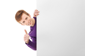 Teenager with poster on white background