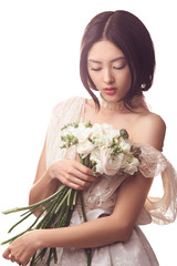 Bride. Asian female with wedding bouquet