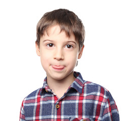 Portrait of cute little boy on white background