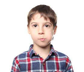 Portrait of cute little boy on white background