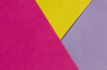 Bright yellow, pink and purple paper texture background diagonal