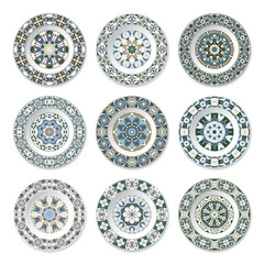 Set of nine decorative plates with a circular colored pattern, top view. White background. Vector illustration.