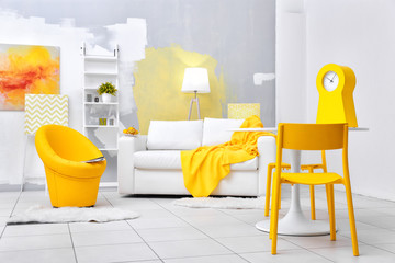 Modern living room with sofa and armchair