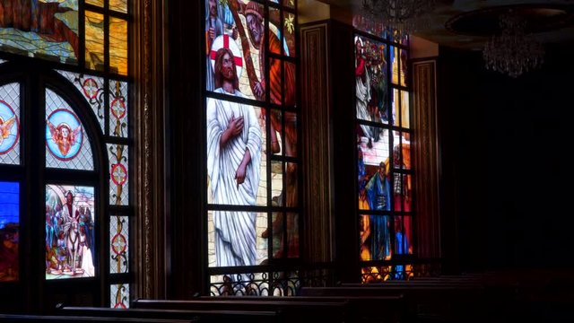 A colorful stained-glass window in the Coptic Christian church in Egypt. 4K UHD video footage.