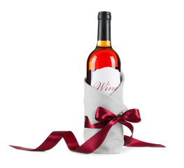 Decorated wine bottle on white background