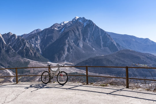 Mountainbike in front of Monte Chiampon