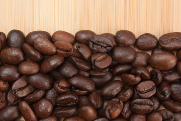 coffee beans on a wooden background