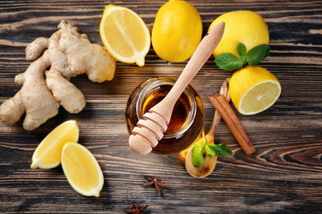 Natural ingredients for cough remedy on wooden background
