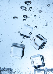 ice cubes and bubbles in water