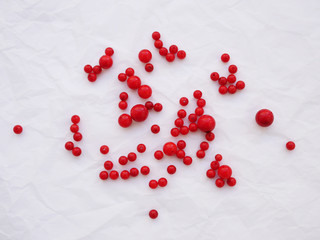 Abstract background with beads of natural stone. Beads of  coral. Materials for handmade jewelry.