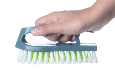 human hand holding a toilet brush on white background