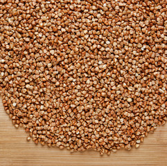 buckwheat groats on a wooden table