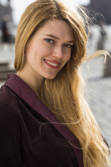 Portrait close up of young beautiful blonde woman