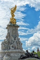 Fototapeta na wymiar Vertical side view for Queen Victoria monument in front of Buckingham Palace