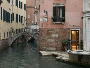 Fototapeta na wymiar Welcoming door in a quiet part of Venice, Italy