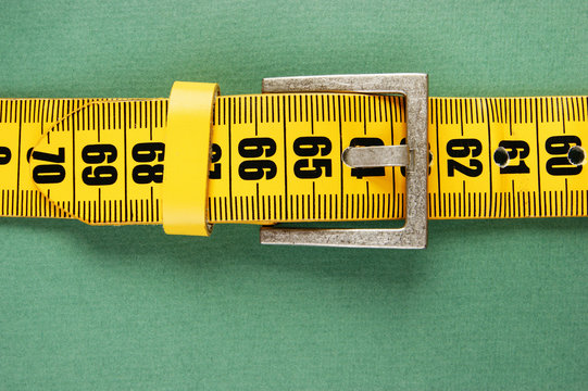 meter belt slimming on the green background