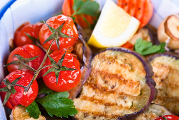 baked aubergines with tomato and vegetables, macro