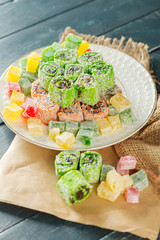 traditional eastern desserts on wooden background