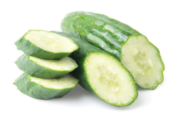 Cucumber and slices isolated over white background.