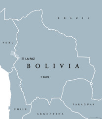 Bolivia political map with capital Sucre and La Paz, national borders and neighbors. Plurinational state and country in South America. Gray illustration isolated over white. English labeling. Vector.