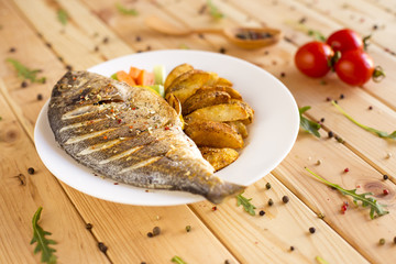 Delicious grilled dorado with vegetables
