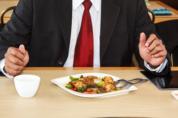Old businesswoman at the restaurant