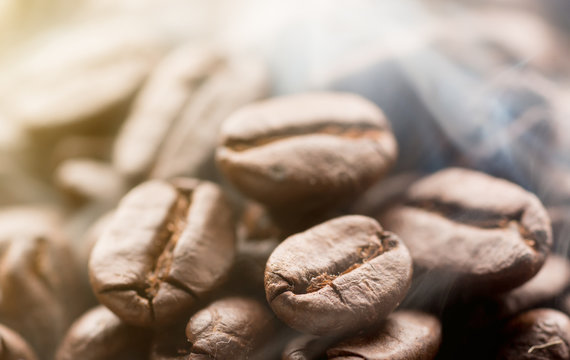 Coffee beans roasting with smoke,Selective focus