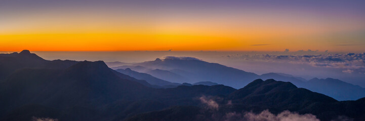 Fototapeta na wymiar Beautiful scenic view at valley on early morning before sunrise from Sri Pada (Adam's Peak), Sri Lanka.