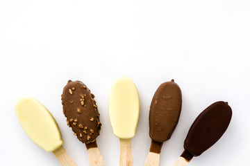 Chocolate ice cream popsicles isolated on white background. 
