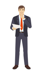 Fototapeta premium Businessman holding a paper and making hush sign